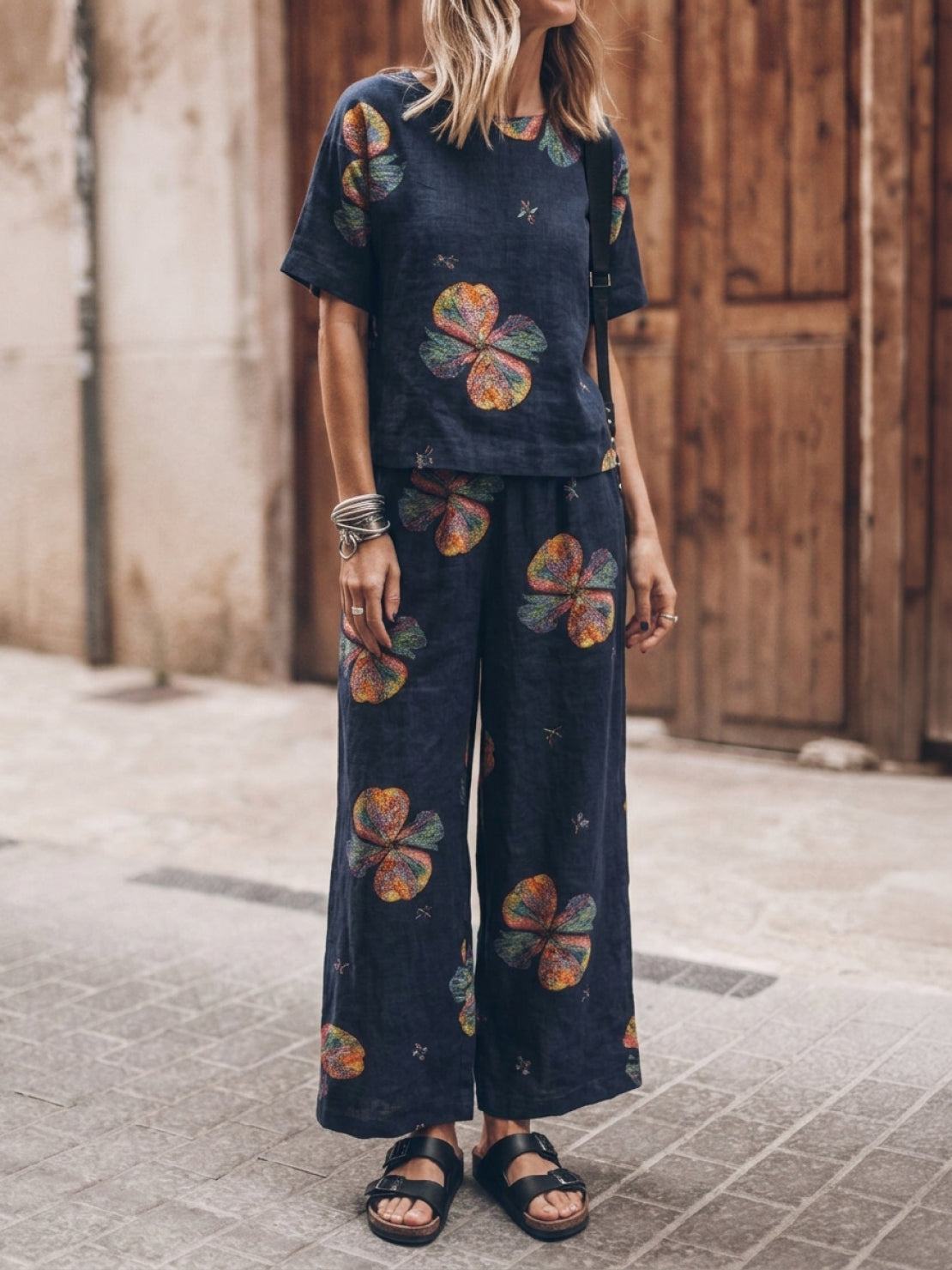 woman wearing soft-tailored loose fit co-ord set with wide-leg bottoms in breathable cotton