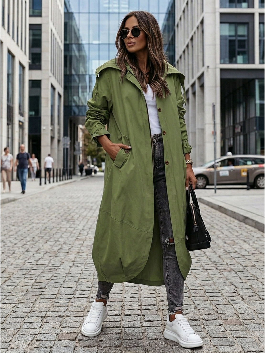 Minimalist hooded coat with oversized fit for travel and lightweight warmth
