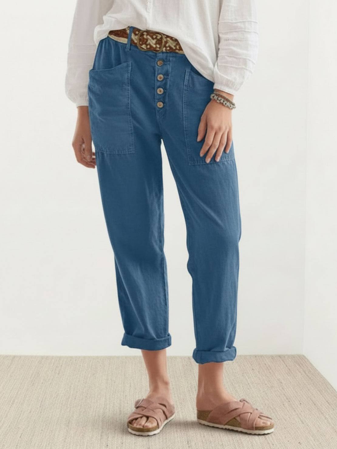 Casual button-down utility-chic trousers with deep pockets and rolled cuffs in durable cotton blend fabric