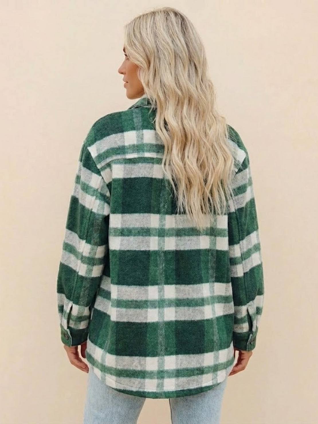 Woman wearing a green and white comfy flannel classic button-down shirt seen from the back