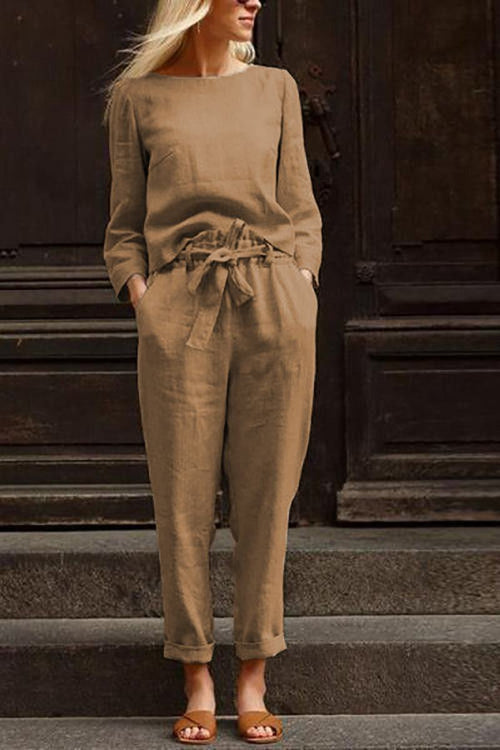 Woman wearing cotton-linen monochrome relaxed longline top and fluid wide-leg pants set in brown
