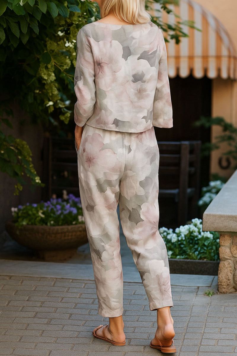 woman wearing cotton-linen monochrome capsule floral print top and pants set standing outdoors