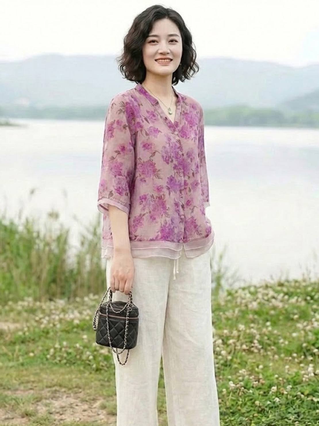 French boutique style organza floral print blouse on white background