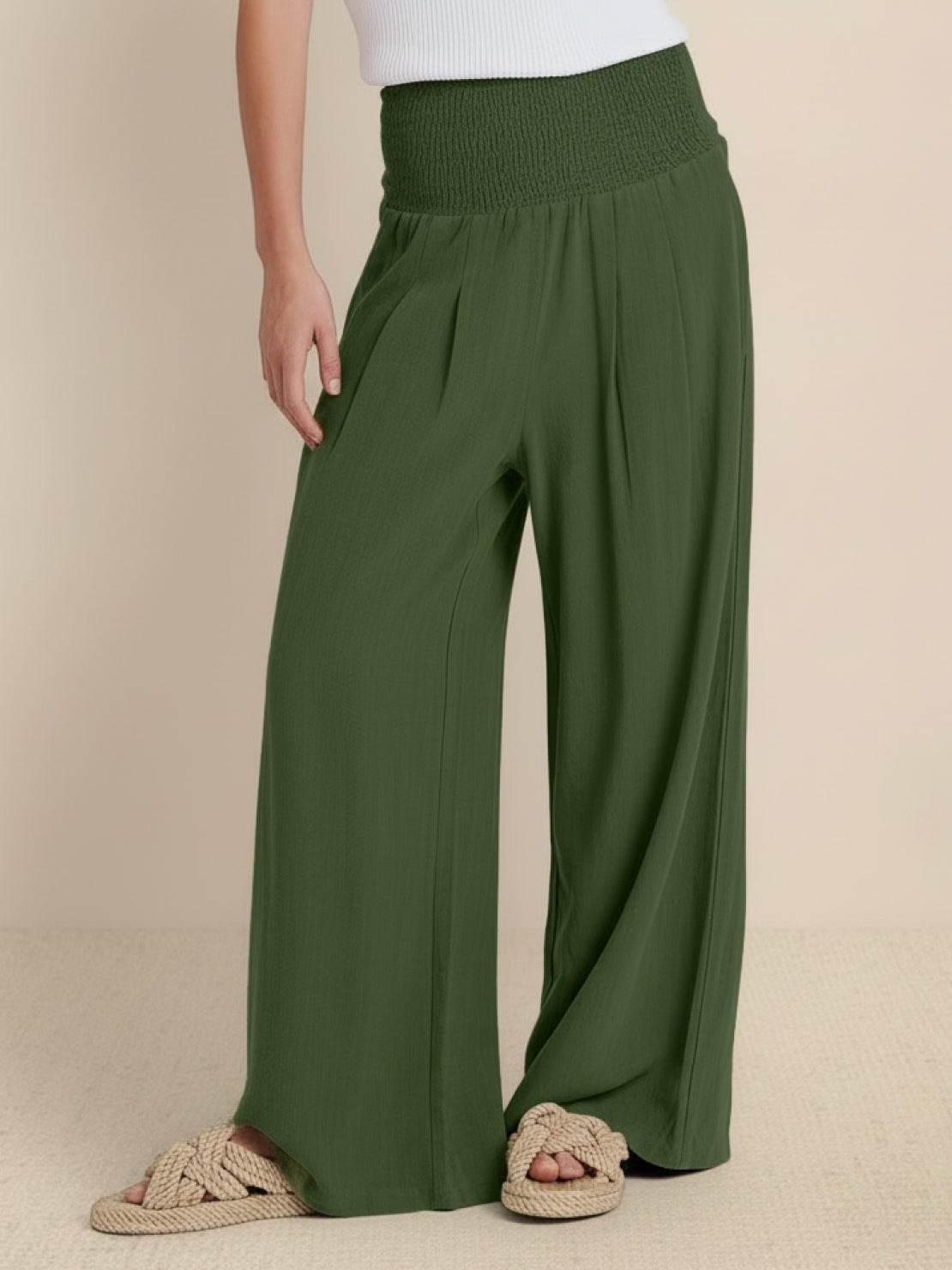 Green high-waist palazzo pants in breathable cotton linen blend with wide legs and pockets