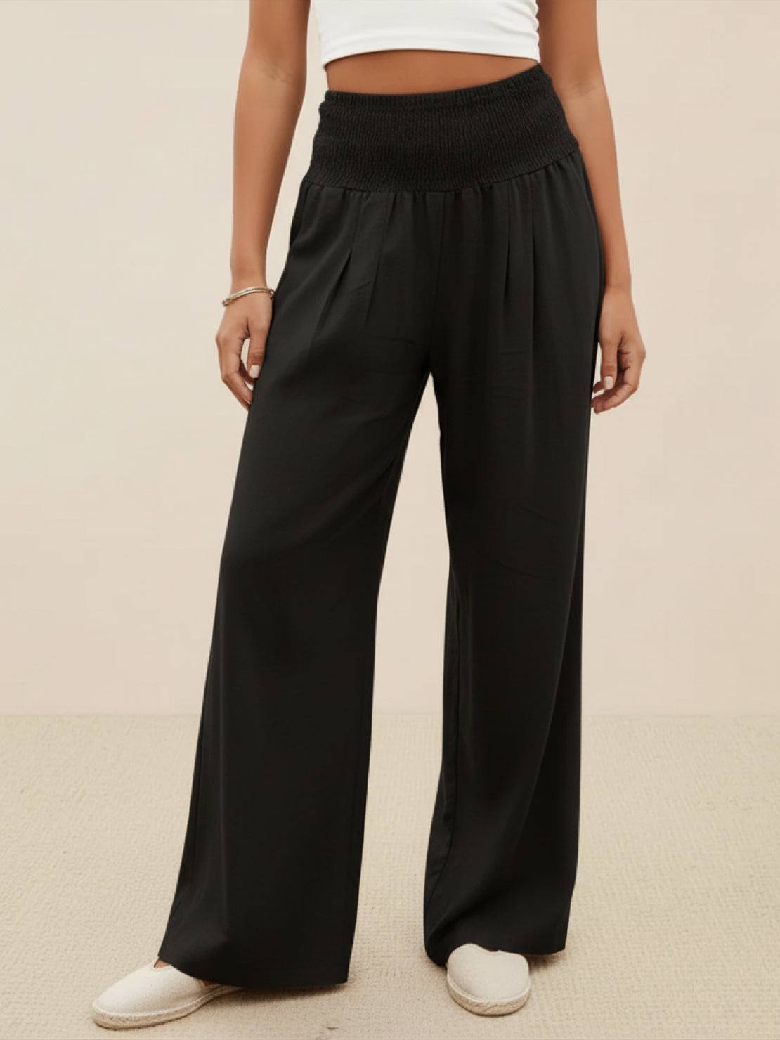 Black high-waist cotton linen palazzo pants with wide-leg fit and smocked waistband.