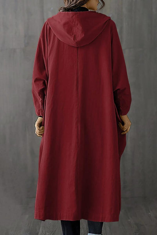 Oversized water resistant windbreaker jacket in red with hood and longline design