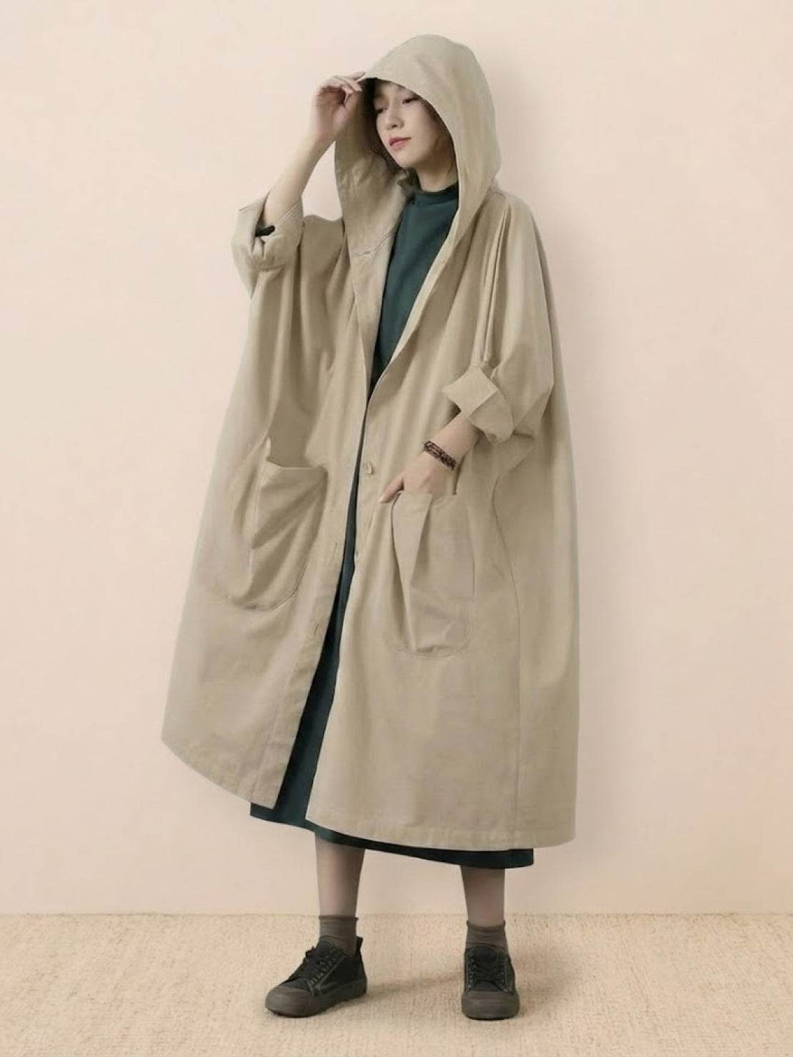 One size oversized water-resistant windbreaker jacket with waterproof design and attached hood