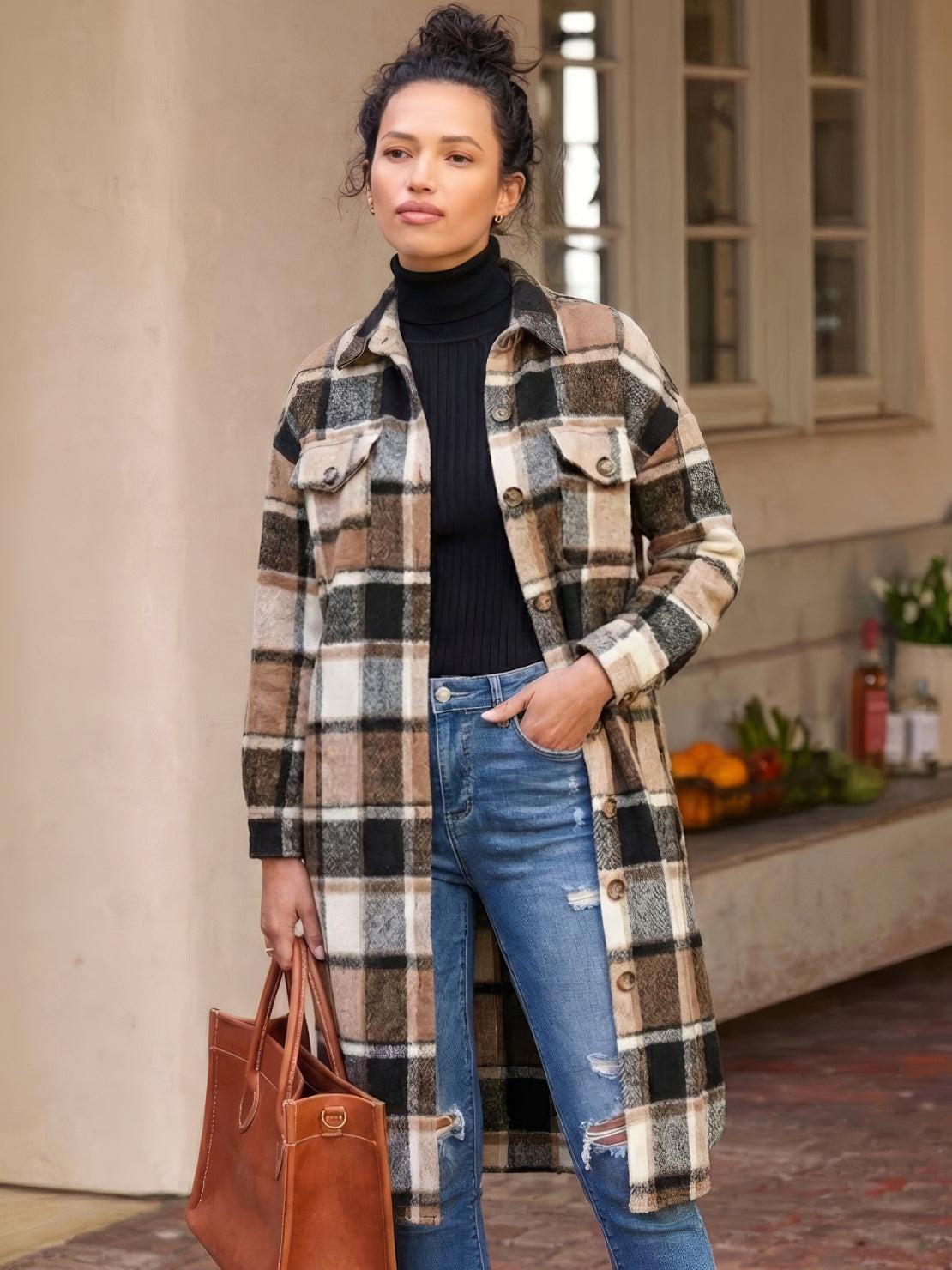 Oversized medium-length blue plaid overshirt jacket with relaxed fit and functional pockets