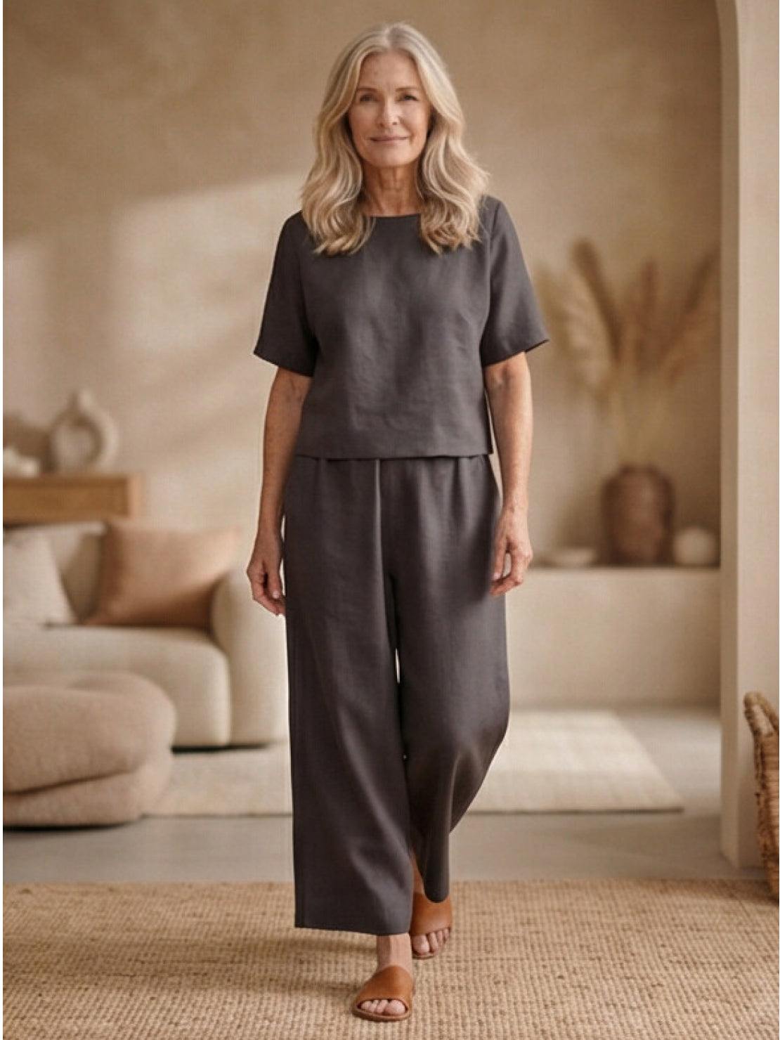 Woman wearing a soft-tailored loose fit co-ord set with wide-leg trousers in a relaxed meadow style