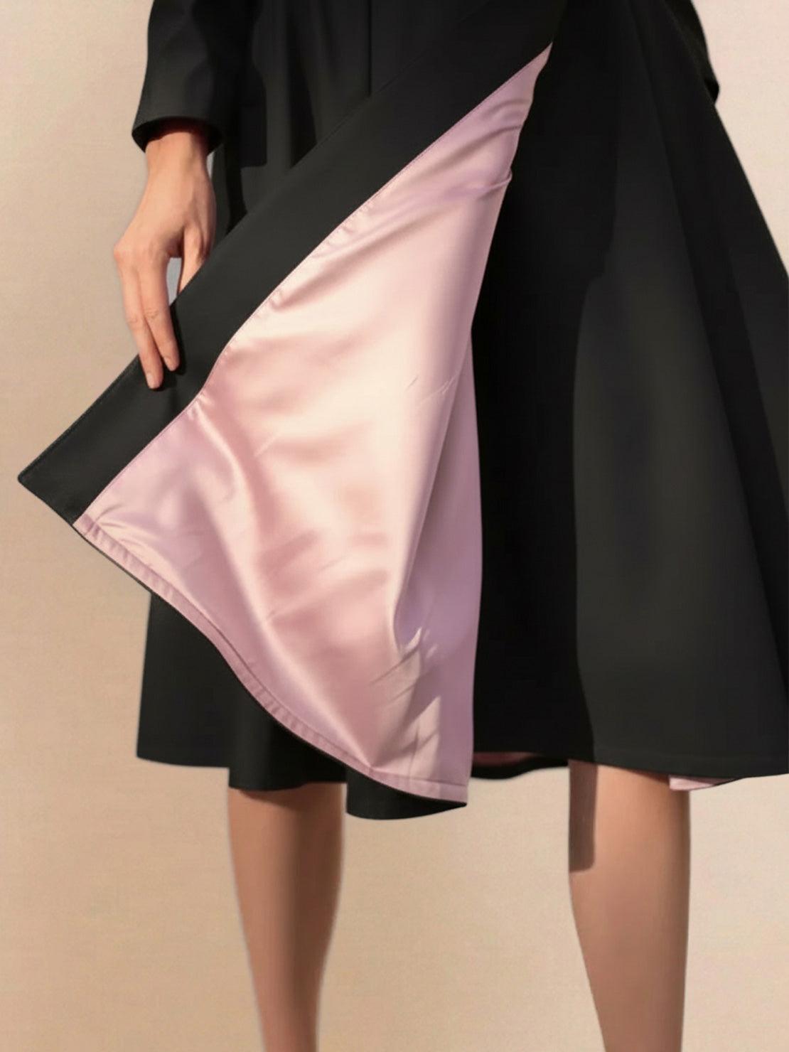 Water-repellent A-line hooded raincoat with belt for women, elegant and insulated weather-resistant outerwear.