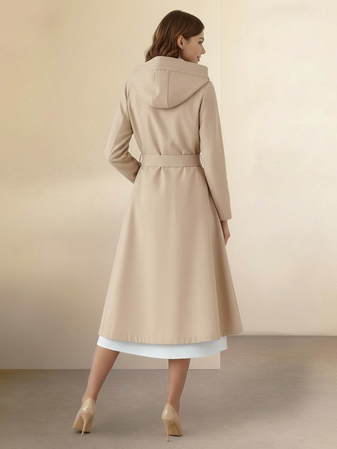 Water-repellent A-line hooded raincoat for women with insulated lining and elegant fit