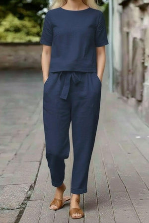 Women's navy blue relaxed fit cotton linen set with short sleeve top and straight-leg pants with drawstring waist