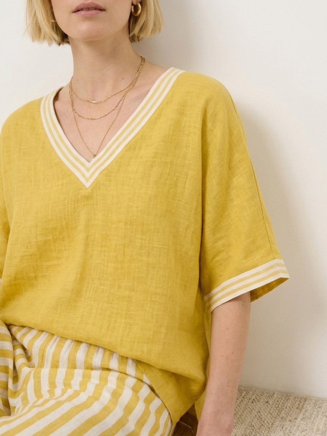 Striped wide-leg co-ord set featuring oversized top with dropped shoulders and matching palazzo pants with elastic waist and side pockets