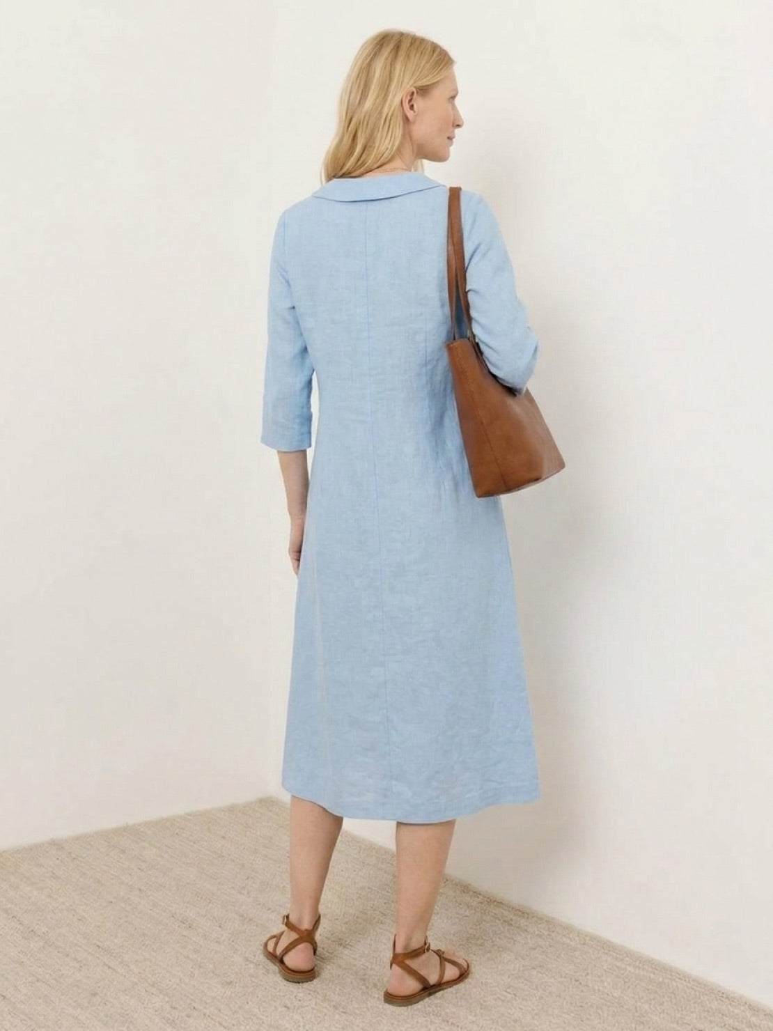 linen-look midi dress with relaxed A-line silhouette and side pockets on white background