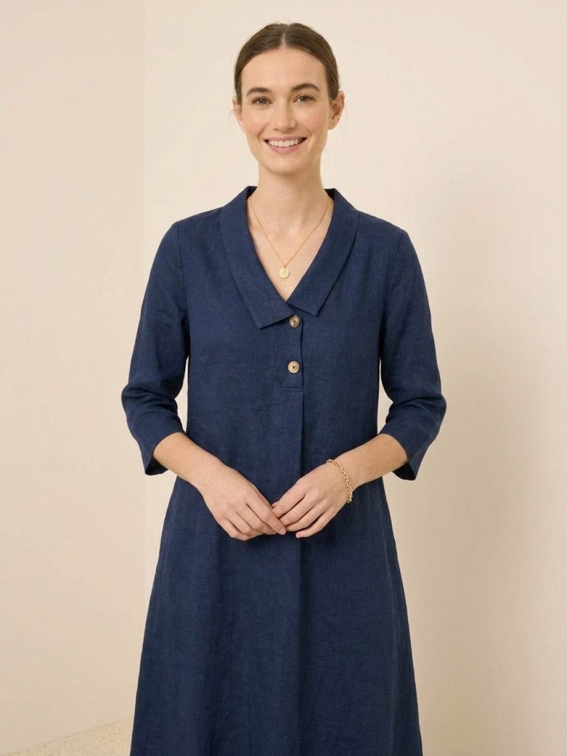 linen-look midi dress in relaxed A-line silhouette with button detail and side pockets