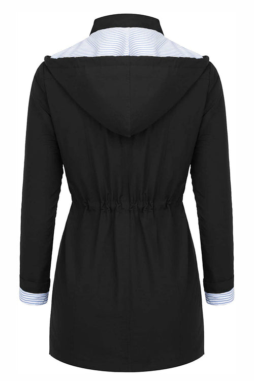 Back view of women's water resistant windbreaker jacket with hood and striped inner lining in Halloween collection