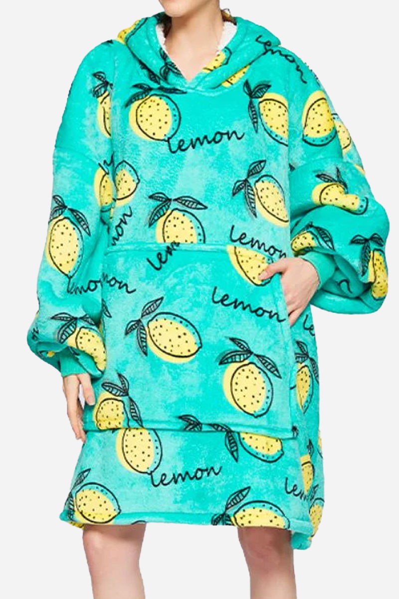 Snuggly oversized hooded fleece sweater with lemon print, soft double-layer fleece, large front pocket, and relaxed blanket fit
