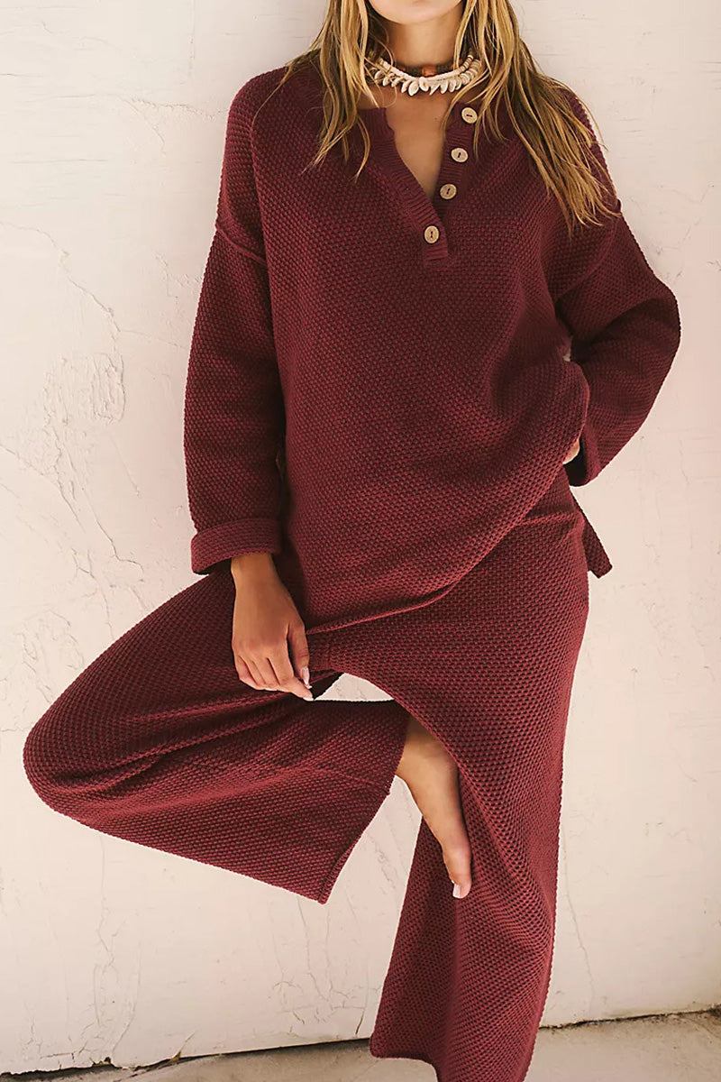 woman wearing burgundy two-piece oversized set with long sleeves and wide pants for multi-weather comfort