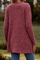 Lightweight ultra soft long knit cardigan in dusty rose color worn by woman outdoors