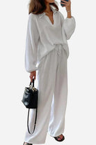 White cotton collared two-piece set with bishop sleeves and loose drawstring pants.