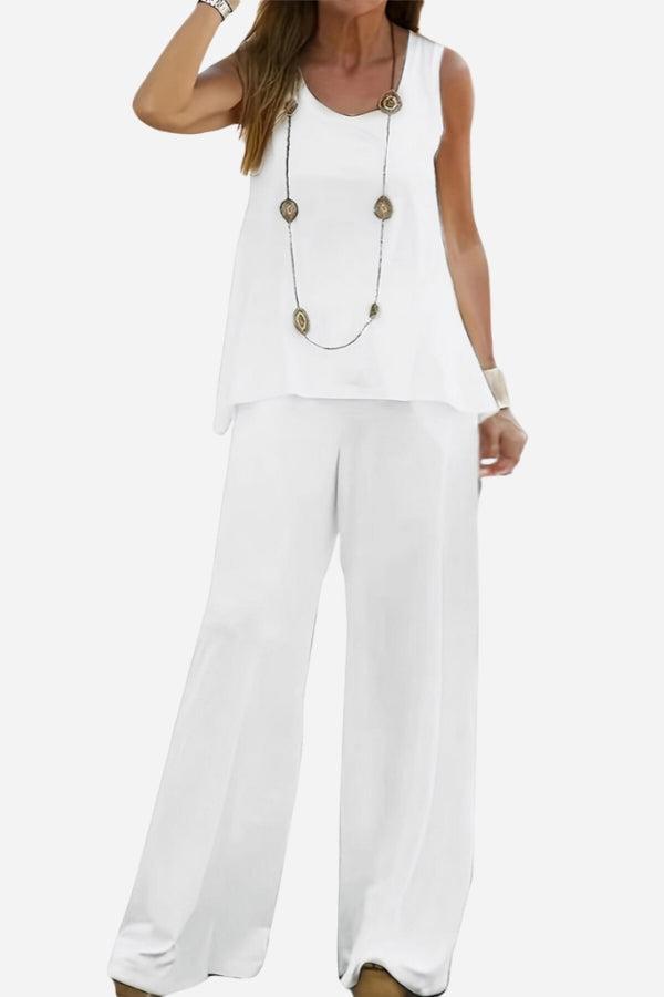 White two-piece co-ord outfit designed to balance apple-shaped body with sleeveless blouse and wide-leg trousers.