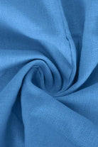Close-up of soft blue cotton fabric for V-neck cotton two-piece trouser set