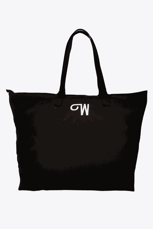 Black waterproof travel bag with sturdy handles and spacious interior for versatile packing