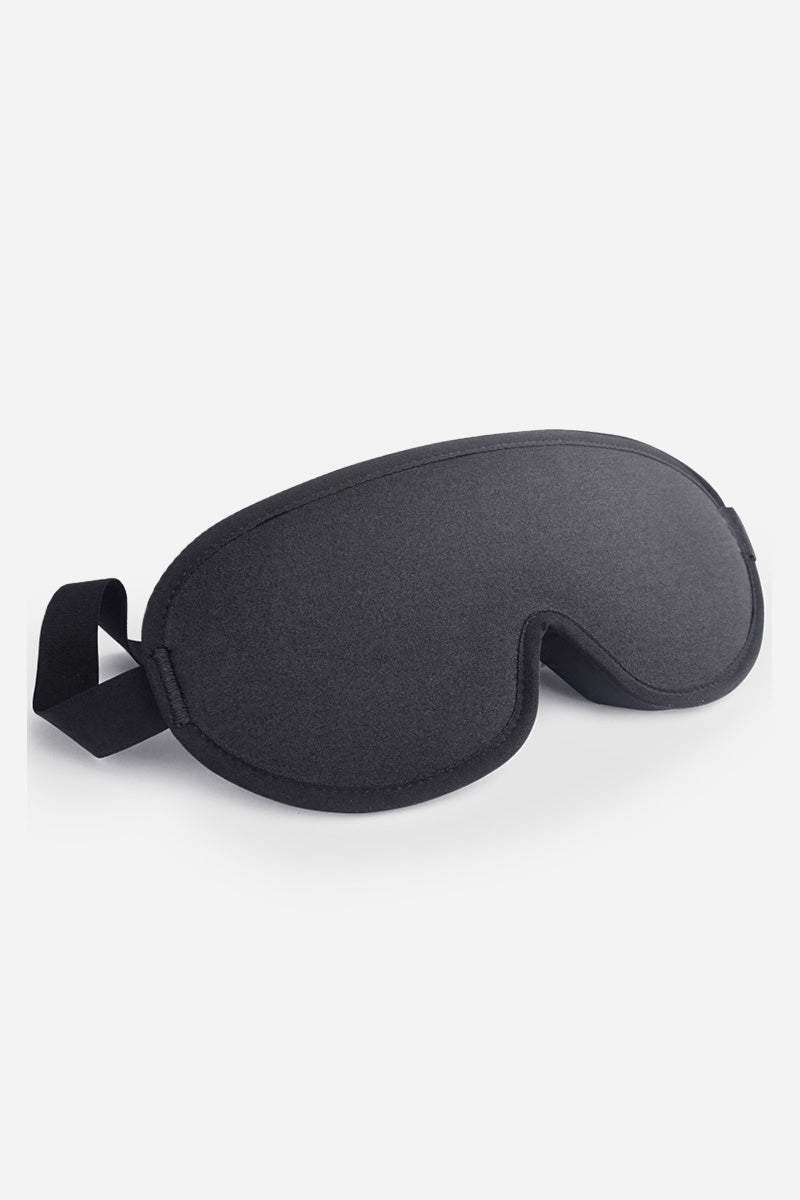 Black travel eye mask from Travel Comfy Kit for blocking light and enhancing rest during travel