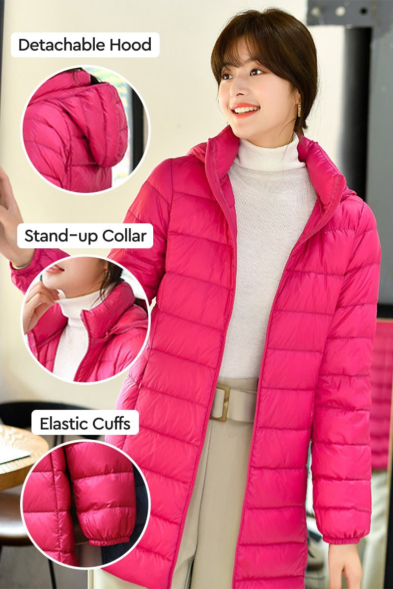 Woman wearing bright pink water-resistant hooded puffer coat with detachable hood, stand-up collar, and elastic cuffs
