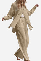 Beige linen blend two-piece set with loose long-sleeve top and wide-leg pants for travel style