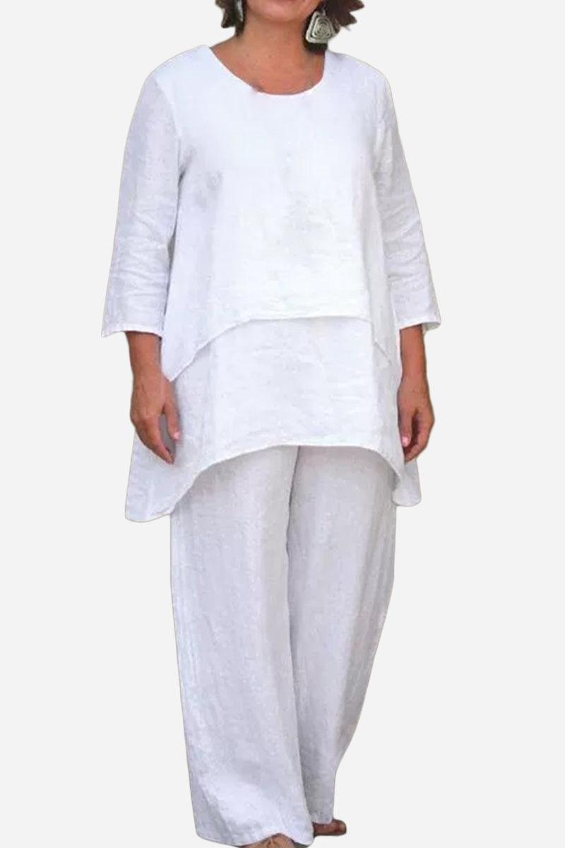 White loose drape two-piece set with asymmetrical oversized top and wide-leg pants.
