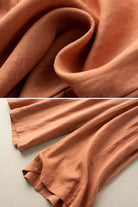 Close-up of soft textured cotton linen Tuscany fabric and sleeve detail from a breathable two-piece set