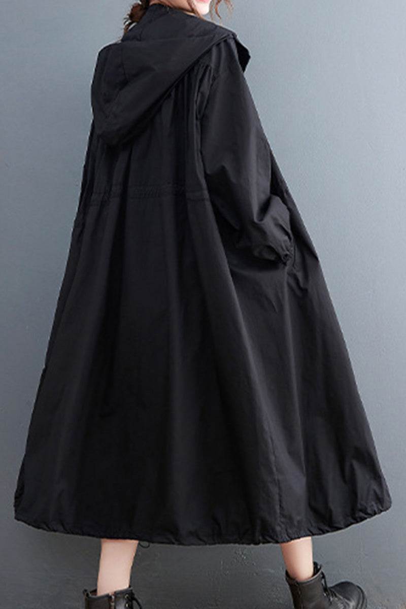 Black oversized all-weather water-resistant windbreaker with hood and roomy fit for versatile protection and comfort