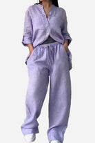 Woman wearing lavender 100% cotton double comfort two-piece set with relaxed fit and button-up top