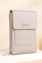 beige anti-theft travel crossbody phone pouch made of durable PU leather with zipper compartments and adjustable strap