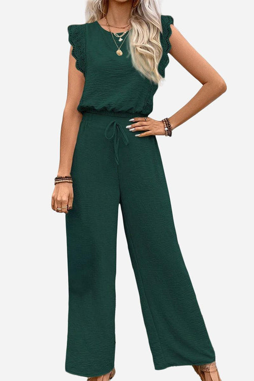Elegant two-piece set for women with lace details, sleeveless top and wide-leg pants in dark green.