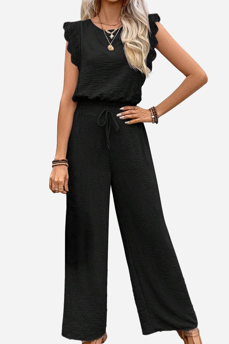 Elegant two-piece women's black outfit with lace sleeves and wide-leg pants