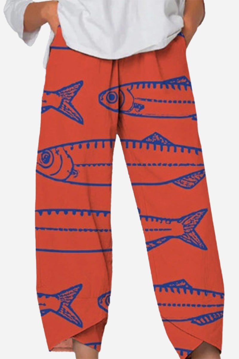 Red breathable cropped pants with artistic sardine pattern and relaxed fit
