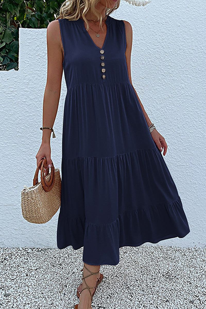 Bohemian tiered midi dress in navy with V-neck and button detail, sleeveless and flowy summer style