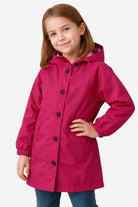 Junior water resistant oversized hooded windbreaker rain jacket for kids in pink color