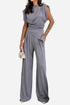 Manhattan Lines Draped two-piece set with asymmetrical sleeveless top and wide-leg pants in grey polyester-spandex blend