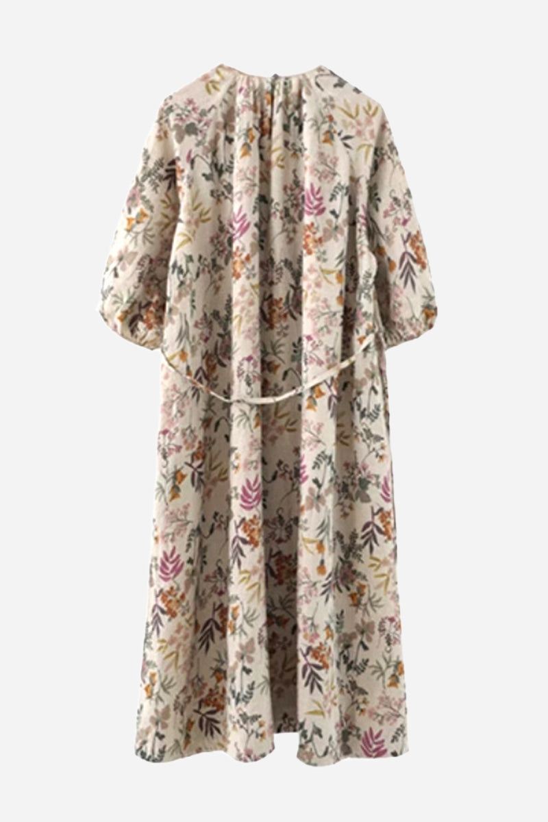 Back view of Italian Summers 100% Linen maxi dress with floral print and tie-back detail
