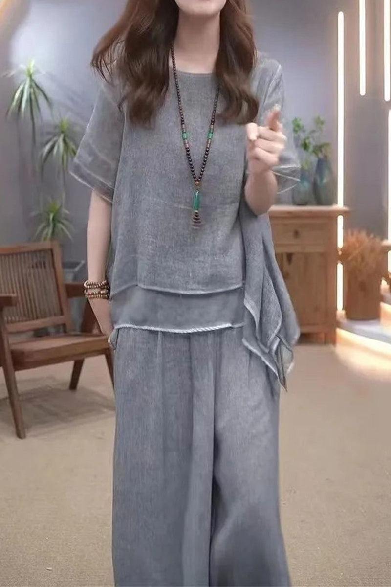 Woman wearing gray Provence cotton linen blend layered top and wide-leg trousers set