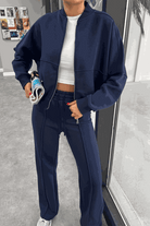 The Voyager Zip Set navy zip-front sweatshirt and wide-leg joggers travel outfit