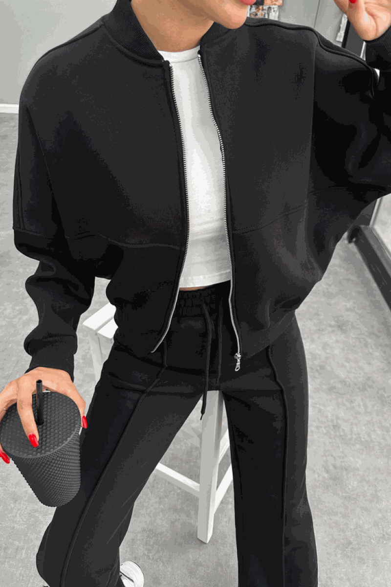 The Voyager Zip Set black zip-front sweatshirt and wide-leg joggers lounge wear with pockets for travel and casual style