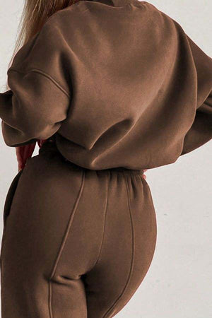 brown Storm Sweater Mock Neck athleisure set with relaxed fit and adjustable waist, back view