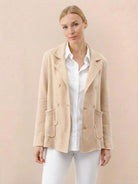 Modern classic double-breasted blazer with raw-edge seaming and cotton-blend fabric for structured comfort
