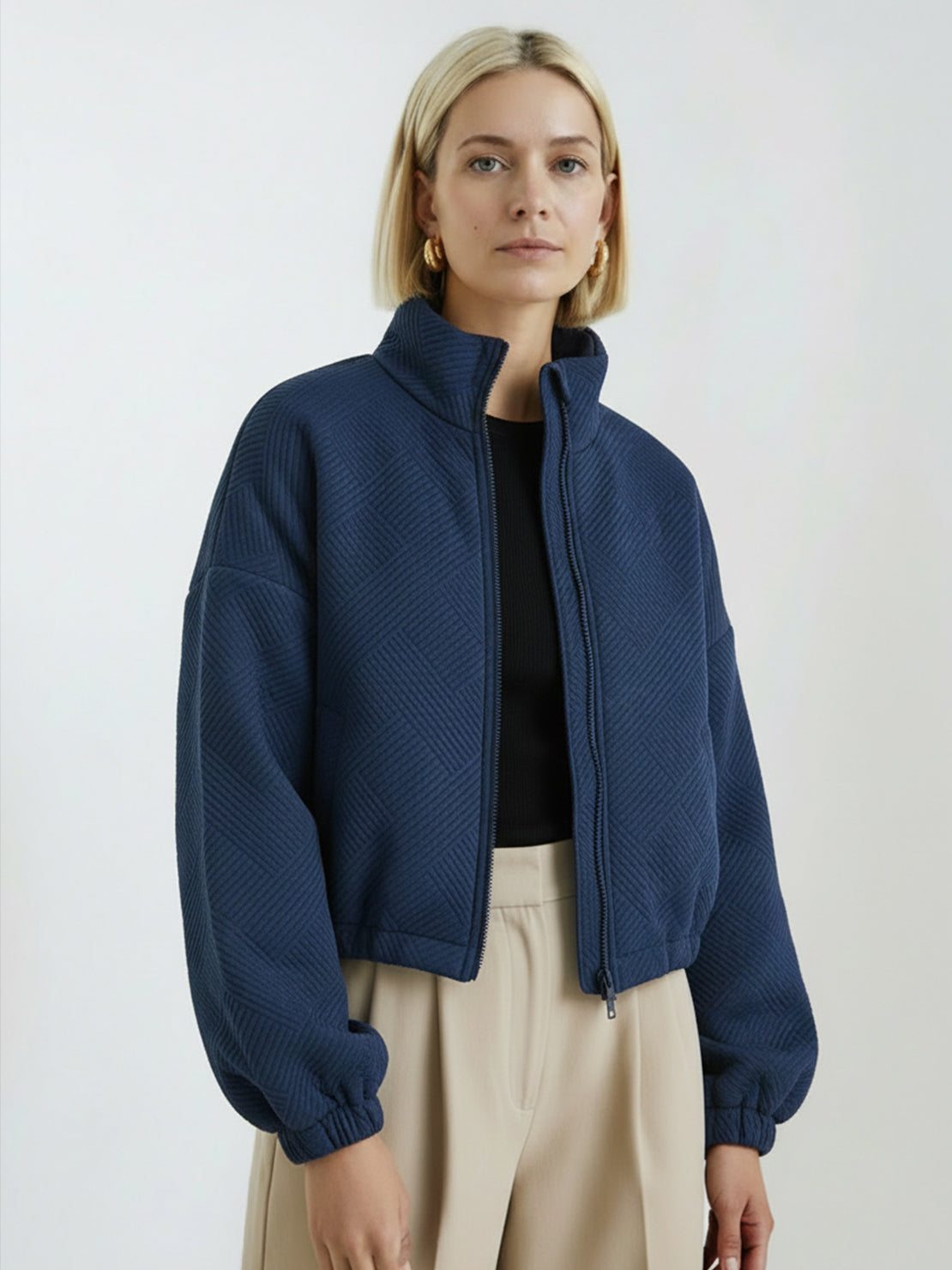 Cropped textured baseball jacket with full zipper and elastic cuffs