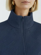 Textured cropped baseball jacket with full zipper and elastic cuffs