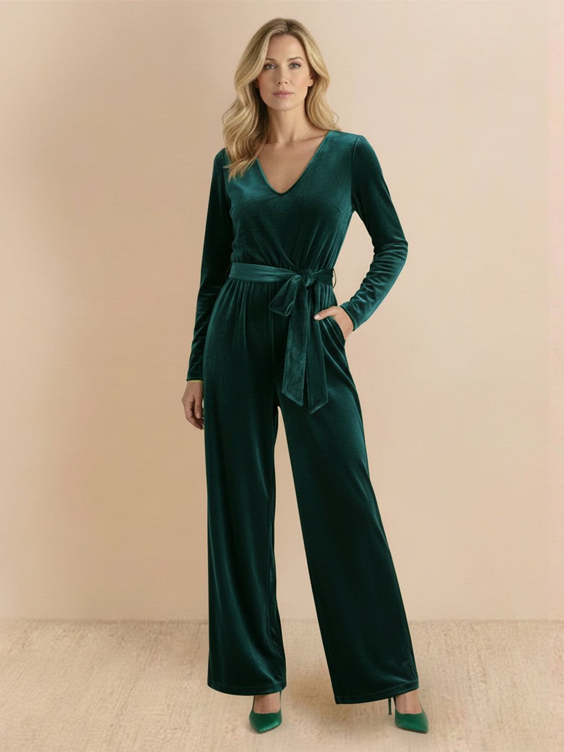 Deep V-neck velvet suit with long sleeves, removable waist tie, and wide-leg pants in structured, flexible fabric